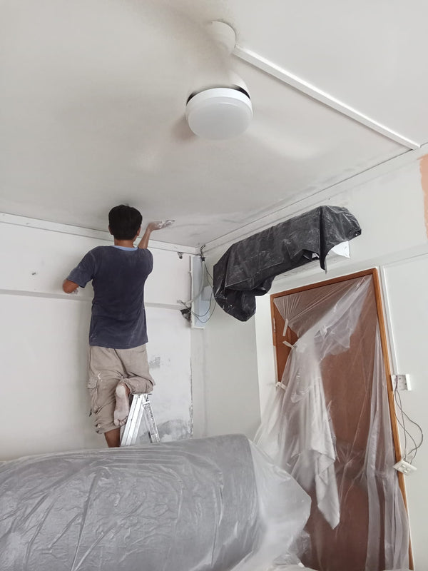 singapore renovation contractor sanding ceiling before painting works