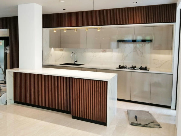 singapore landed house renovated kitchen glossy beige doors wood timber strips kitchen island white sintered stone countertop