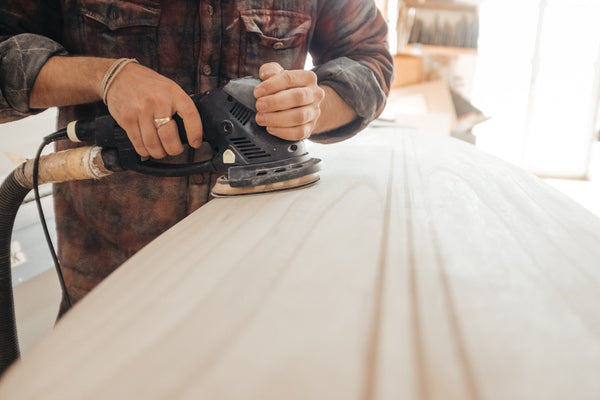 carpentry manufacturer in singapore making a cabinet or furniture in solid wood