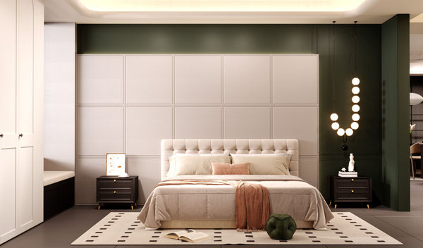 A modern bedroom interior featuring a tufted beige upholstered bed centered against a paneled wall, with matching beige bedding, dark wood nightstands, a patterned rug, and a sculptural wall light on the right.