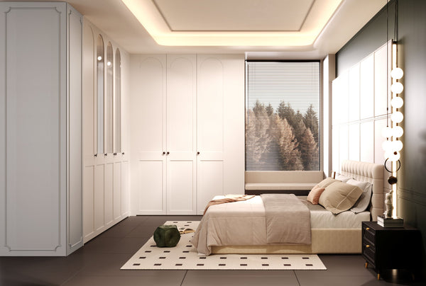 A modern living room interior featuring a green media console and matching cabinet, a round white rug, a low wooden coffee table, and warm beige walls under recessed lighting.