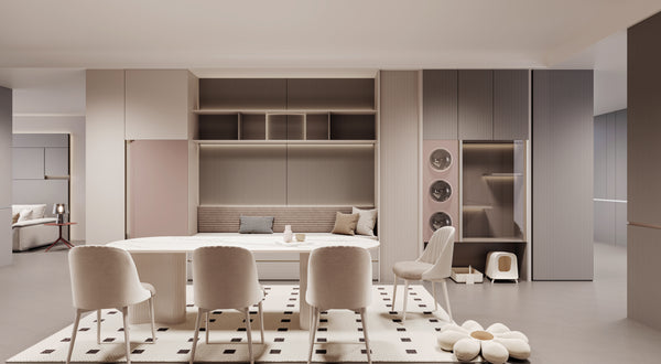 Modern kitchen with white cabinets, marble countertops, and a dining area.