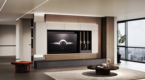 Modern living room with a large TV mounted on a wall unit.