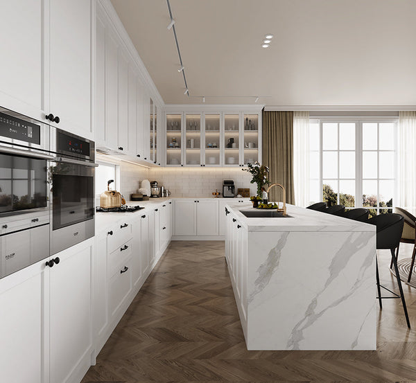 Modern kitchen with white cabinets, marble island, and stainless steel appliances designed by HomeShake Interior Designers in Singapore for Home Renovation Projects with Formaldehyde-Free Panels