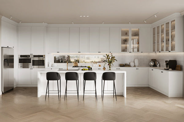 Modern kitchen with white cabinets, marble countertops, and black bar stools. lacquered panels in shaker door design with white colour and black handles and kitchen island with black bar stools.