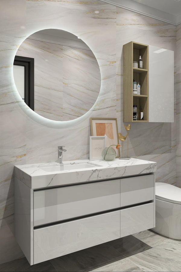 Modern bathroom with a vanity, mirror, and toilet.