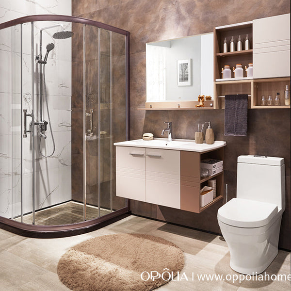 Modern bathroom with shower enclosure, sink, and toilet.